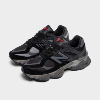 Tenis NB negros con suela gris