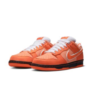 Tenis Nike naranja, blanco y negro